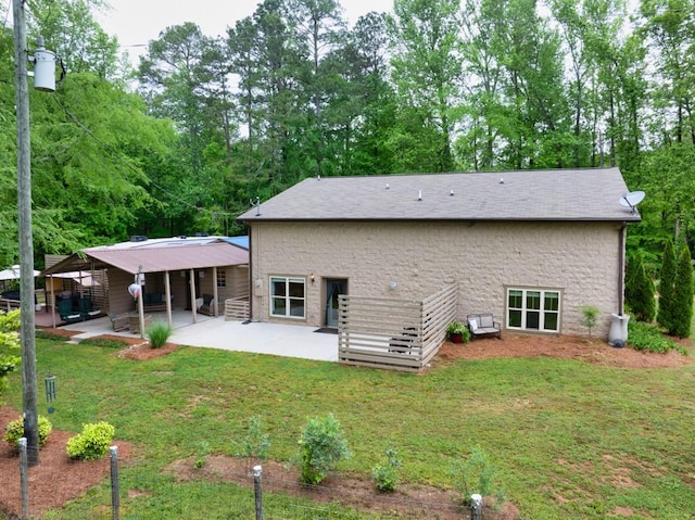 659 Creek Nation Rd, Jefferson, GA 30549 - rear view of house featuring a patio, a lawn, and stone siding