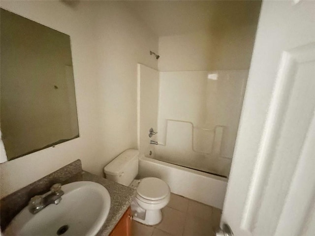1017 Wheel House Ln Unit C, Monroe, GA 30655 - bathroom featuring toilet, vanity, tile patterned flooring, and tub / shower combination
