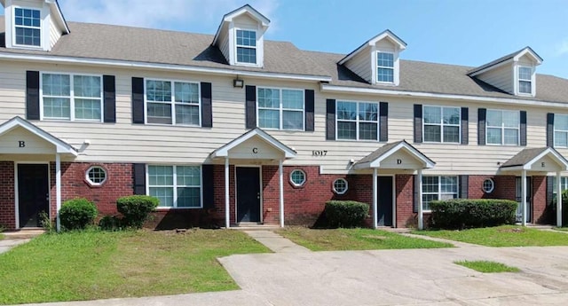 1017 Wheel House Ln Unit C, Monroe, GA 30655 - multi unit property with brick siding and a front lawn