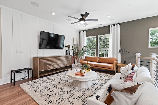 2535 Astaire Ct, Atlanta, GA 30318 - living room with plenty of natural light, light wood-style floors, ceiling fan, recessed lighting, and baseboards