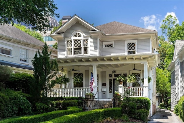 view of front of house featuring ceiling fan and covered porch