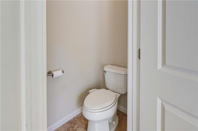 6463 Century Park Pl SE, Mableton, GA 30126 - bathroom featuring baseboards, toilet, and tile patterned flooring