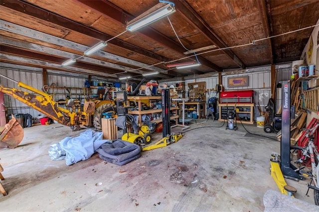 garage with a workshop area