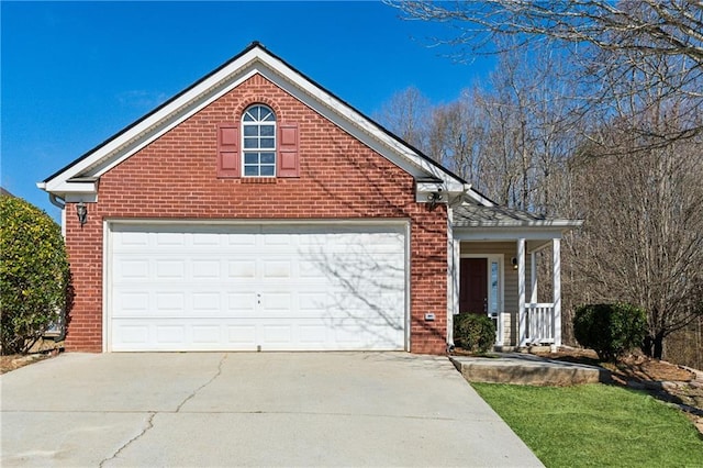 view of front facade featuring a garage and covered porch