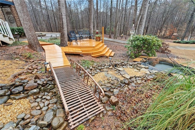 view of yard featuring a wooden deck