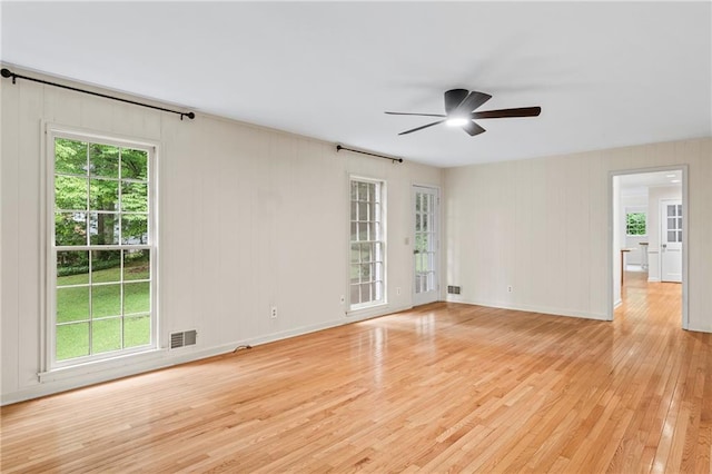 870 Richmond Hill Dr, Marietta, GA 30068 - empty room with a ceiling fan, light wood-style flooring, plenty of natural light, and baseboards