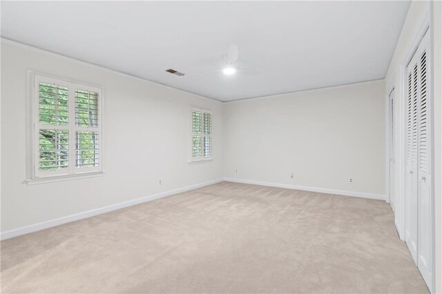 870 Richmond Hill Dr, Marietta, GA 30068 - unfurnished bedroom featuring baseboards, light colored carpet, crown molding, and a ceiling fan