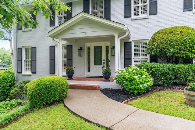 870 Richmond Hill Dr, Marietta, GA 30068 - doorway to property with a porch and brick siding