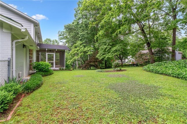 870 Richmond Hill Dr, Marietta, GA 30068 - view of green lawn with a sunroom