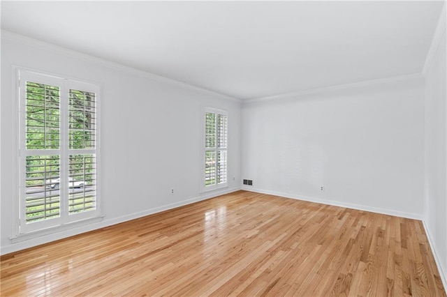 870 Richmond Hill Dr, Marietta, GA 30068 - spare room with crown molding, light wood-style floors, and baseboards