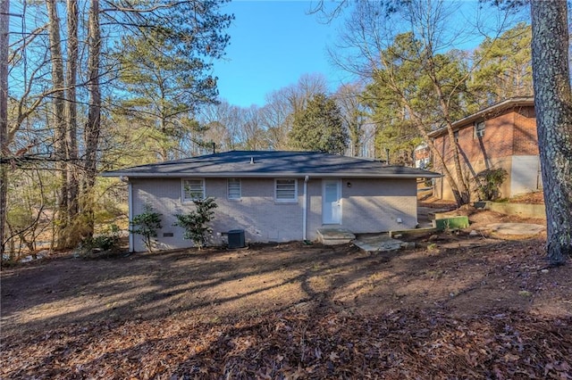 back of property with central AC unit