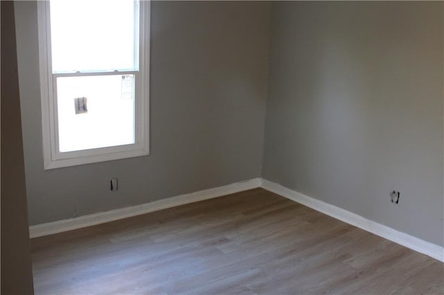 empty room with light wood-type flooring