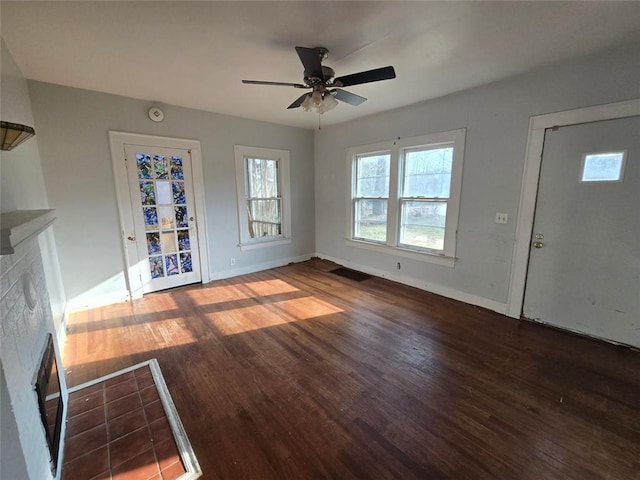 entrance foyer featuring dark hardwood / wood-style flooring and ceiling fan