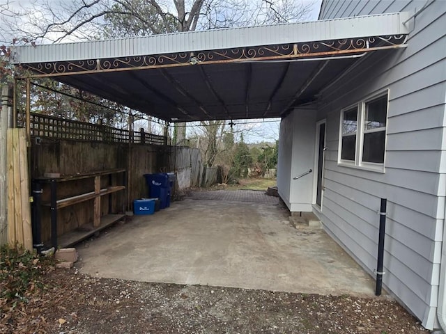 view of patio featuring a carport