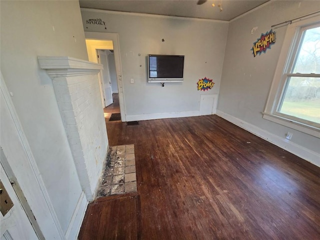 unfurnished living room with hardwood / wood-style flooring and ceiling fan