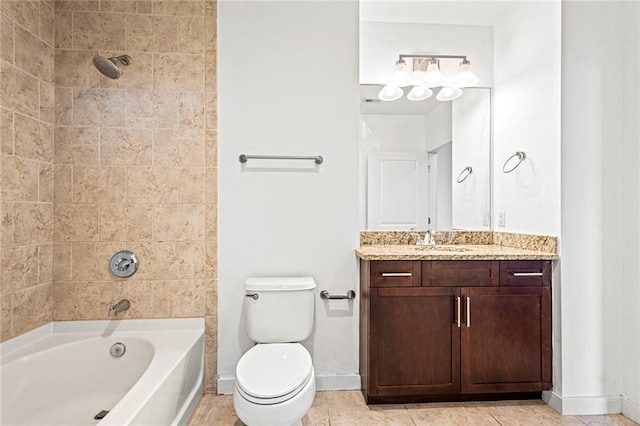 bathroom with baseboards, vanity, toilet, and shower / bathtub combination