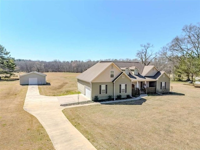 view of front of property featuring a front lawn and a garage