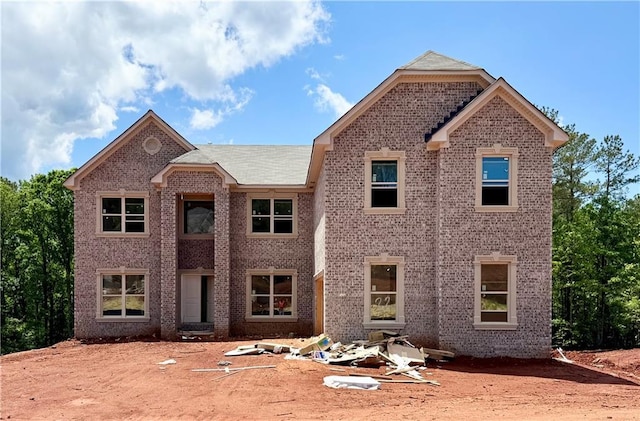 view of front of home with brick siding