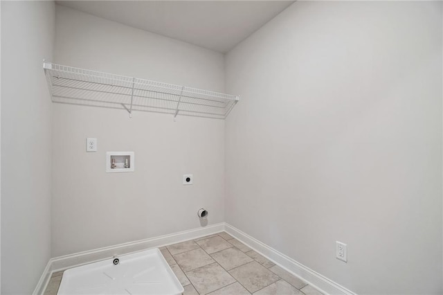 washroom with washer hookup, baseboards, hookup for an electric dryer, and laundry area