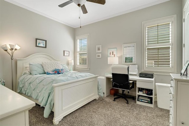 bedroom with light colored carpet, crown molding, and ceiling fan