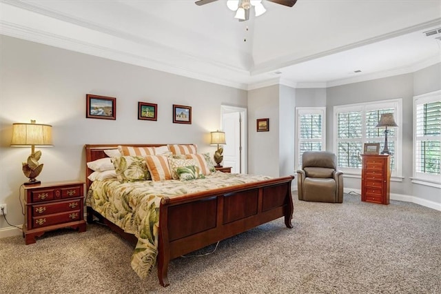 carpeted bedroom featuring ceiling fan, baseboards, and ornamental molding