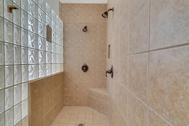 full bathroom with a tile shower