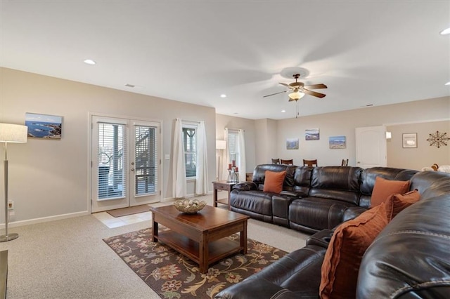 living area with recessed lighting, carpet, and a ceiling fan