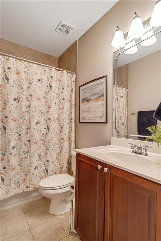 carpeted bedroom with visible vents and baseboards