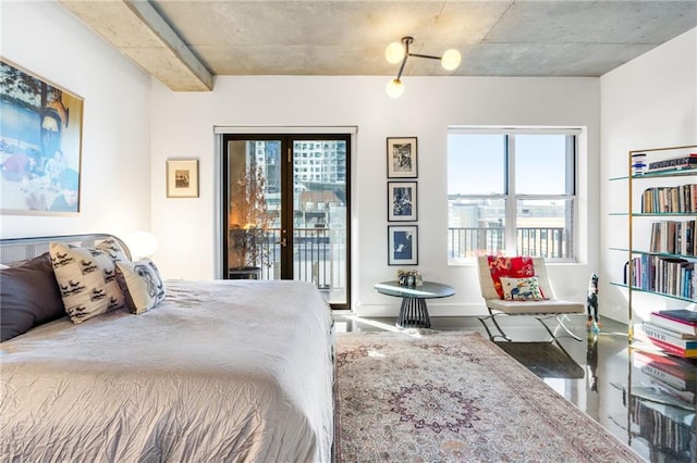 bedroom with access to exterior and french doors