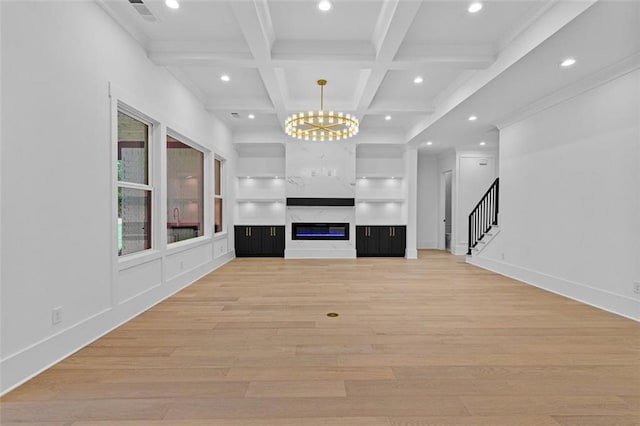 unfurnished living room featuring light wood-style floors, recessed lighting, beamed ceiling, visible vents, and stairway