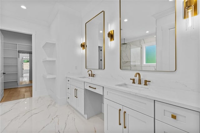 full bathroom featuring double vanity, a sink, marble finish floor, and recessed lighting
