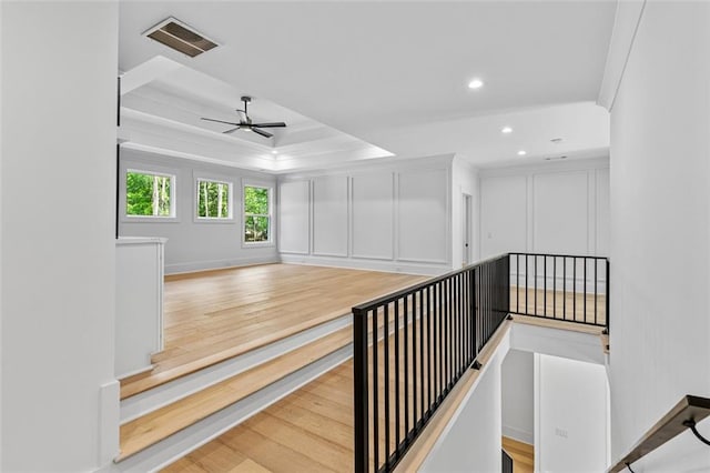 staircase with recessed lighting, ceiling fan, visible vents, and baseboards