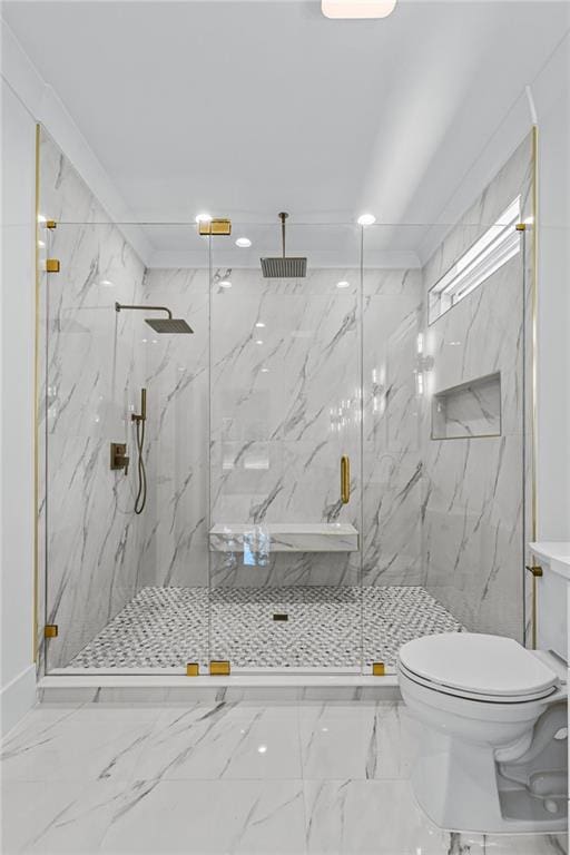 bathroom featuring recessed lighting, marble finish floor, a marble finish shower, and toilet