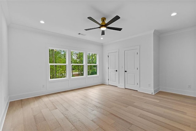 unfurnished bedroom featuring light wood-style floors, ornamental molding, baseboards, and recessed lighting