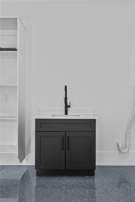interior space featuring vanity and a walk in closet