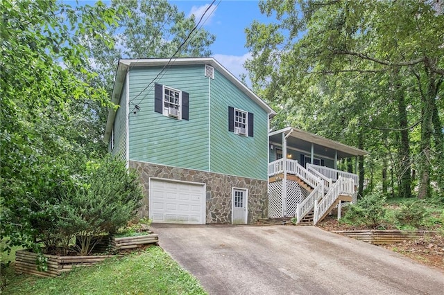 view of front of property with a garage