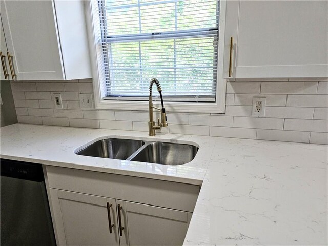 4093 Chapel Mill Bnd, Decatur, GA 30034 - kitchen featuring dishwasher, a sink, tasteful backsplash, and light stone counters