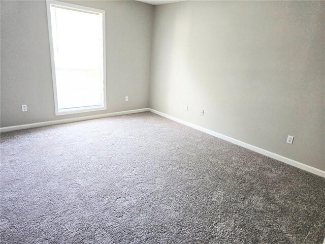 4093 Chapel Mill Bnd, Decatur, GA 30034 - spare room featuring baseboards and carpet flooring