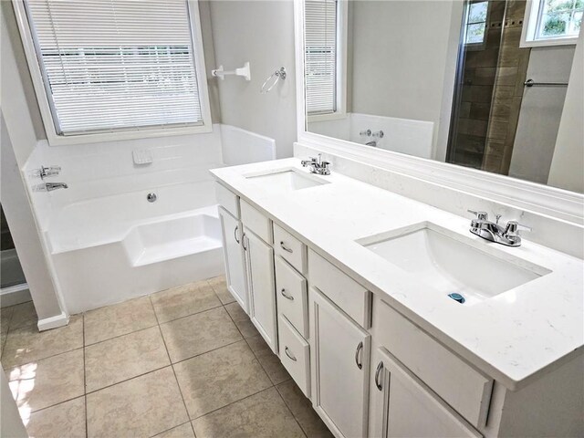 4093 Chapel Mill Bnd, Decatur, GA 30034 - full bathroom featuring tile patterned flooring, a sink, double vanity, and a bath