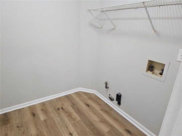 4093 Chapel Mill Bnd, Decatur, GA 30034 - laundry room featuring wood finished floors, laundry area, baseboards, gas dryer hookup, and hookup for a washing machine
