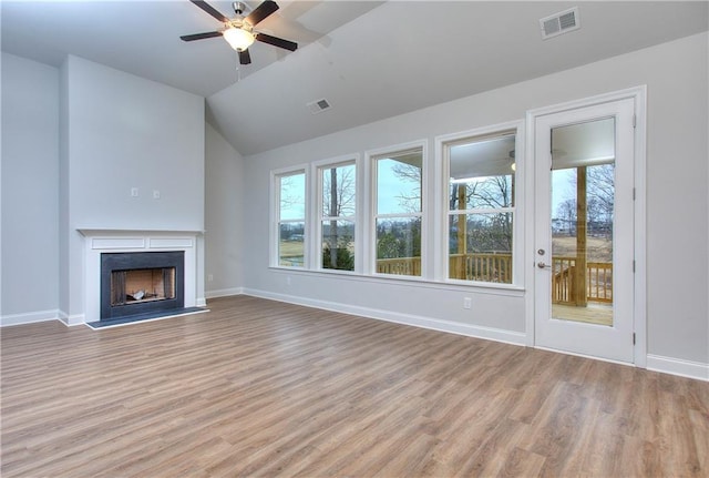 135 Applewood Way, Homer, GA 30547 - unfurnished living room featuring ceiling fan, vaulted ceiling, and light hardwood / wood-style flooring