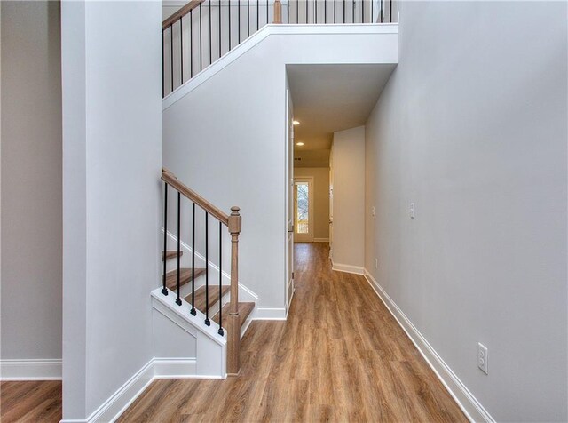 135 Applewood Way, Homer, GA 30547 - hallway featuring a towering ceiling and wood-type flooring