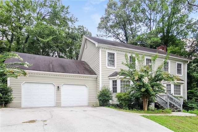 colonial home featuring a garage