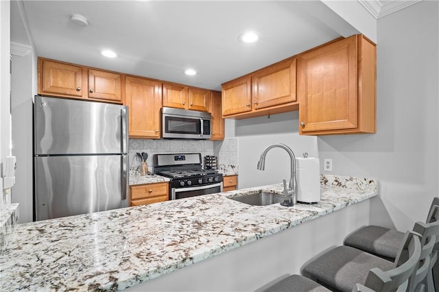 31 Country Place Ct, Alpharetta, GA 30005 - kitchen with stainless steel appliances, a peninsula, light stone counters, decorative backsplash, and recessed lighting