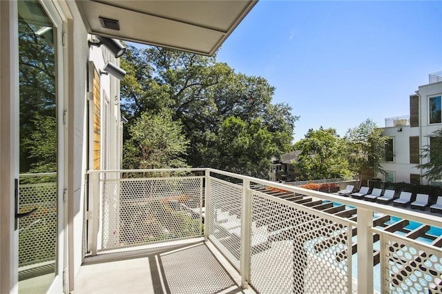 balcony featuring visible vents