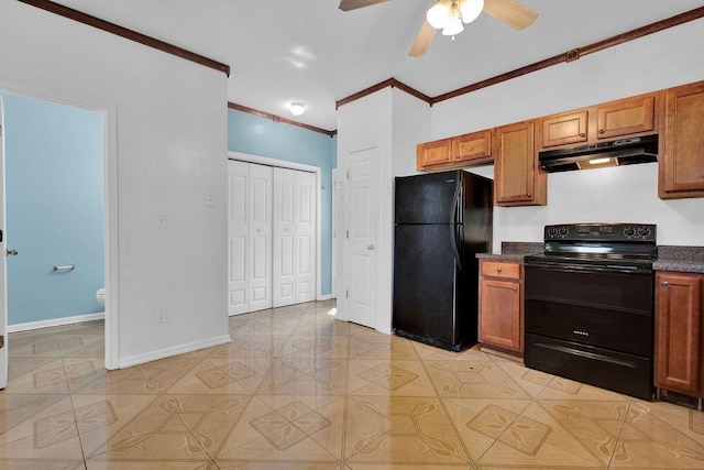kitchen with ceiling fan, crown molding, dark countertops, black appliances, and under cabinet range hood