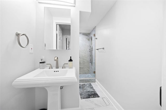 bathroom featuring walk in shower