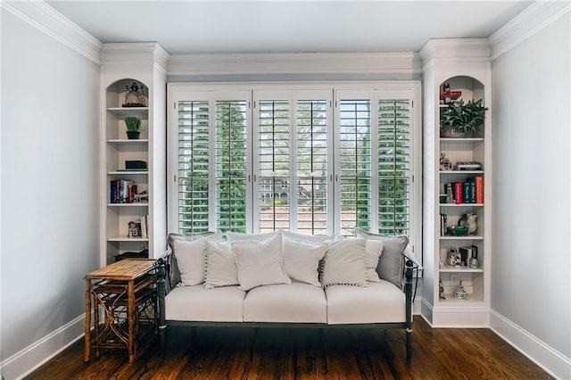 sitting room with wood finished floors and baseboards