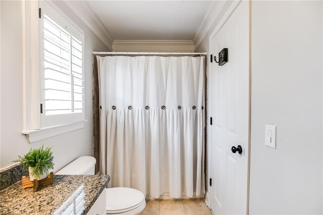 bathroom featuring tile patterned flooring, toilet, ornamental molding, a shower with curtain, and vanity