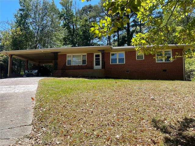 ranch-style home featuring a carport